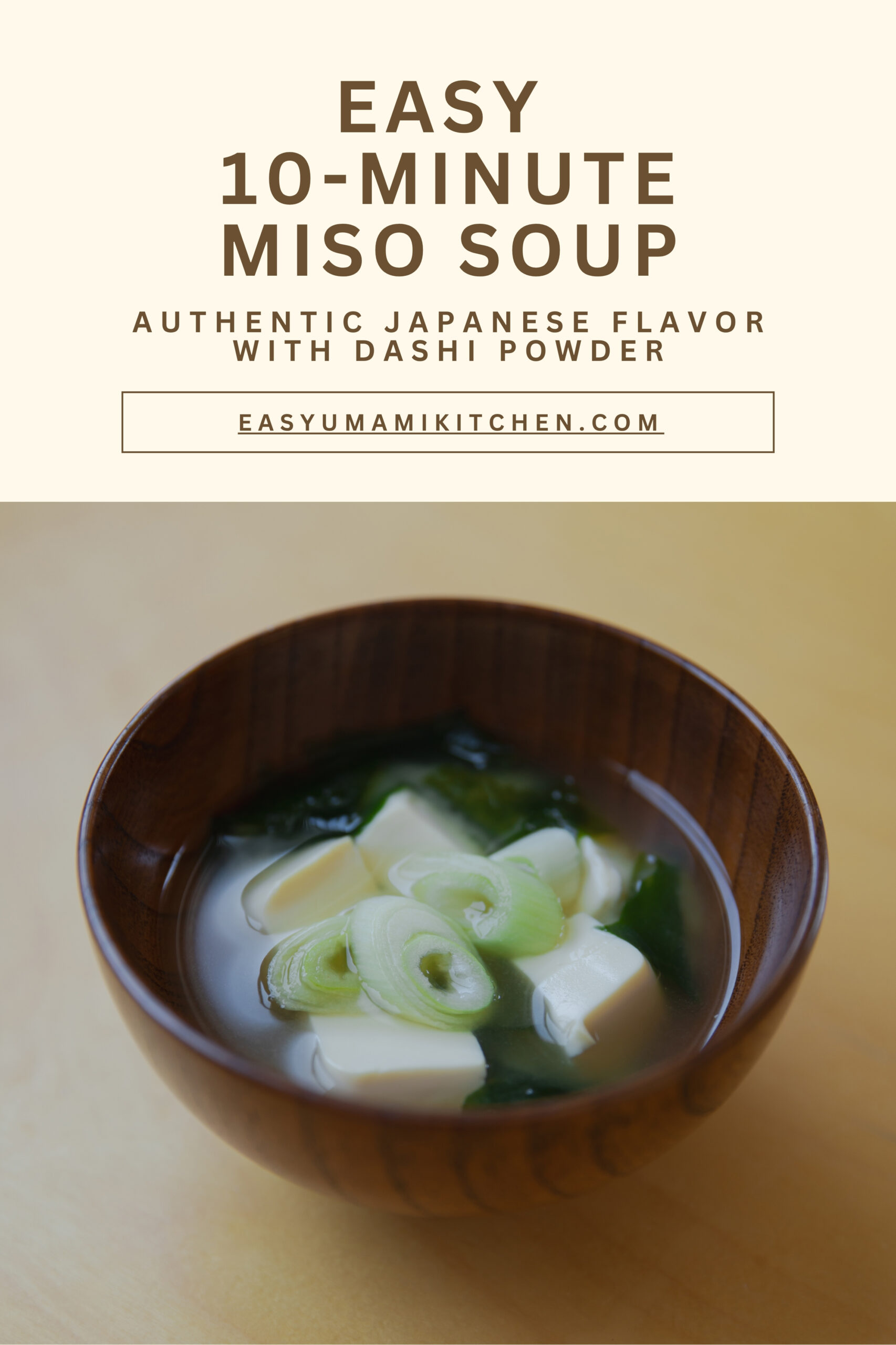 Homemade Japanese miso soup with tofu and green onions in a wooden bowl