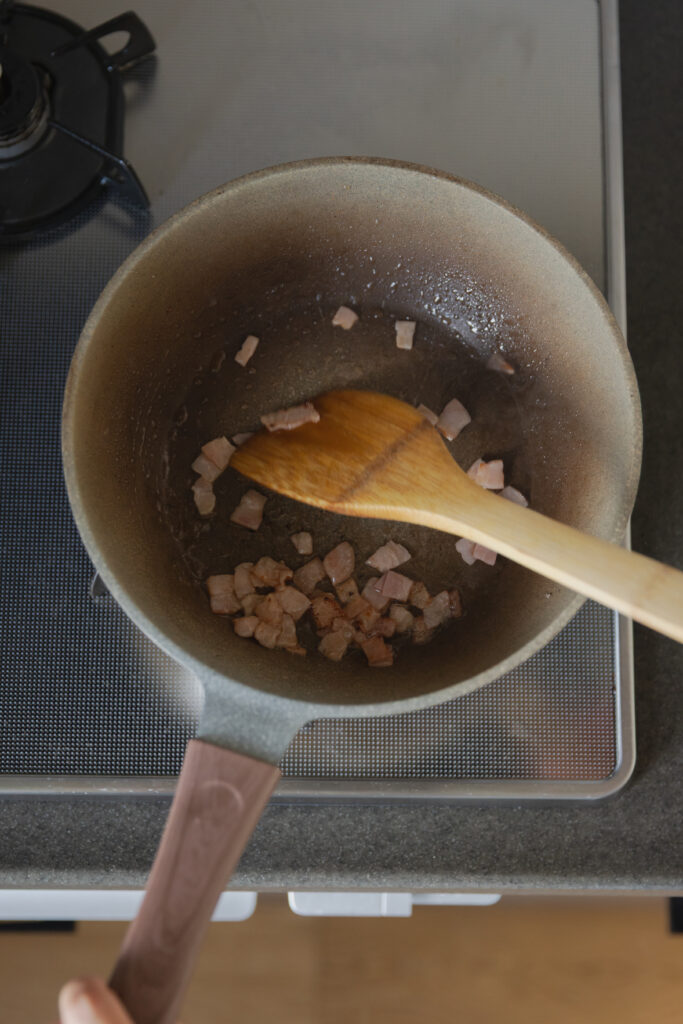 Homemade Japanese fried rice chahan with egg and bacon in a bowl