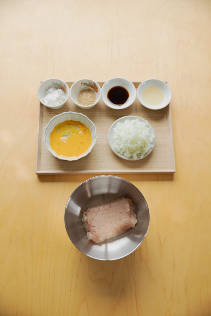 Homemade sweet and savory Japanese tamagoyaki rolled omelet sliced on a plate