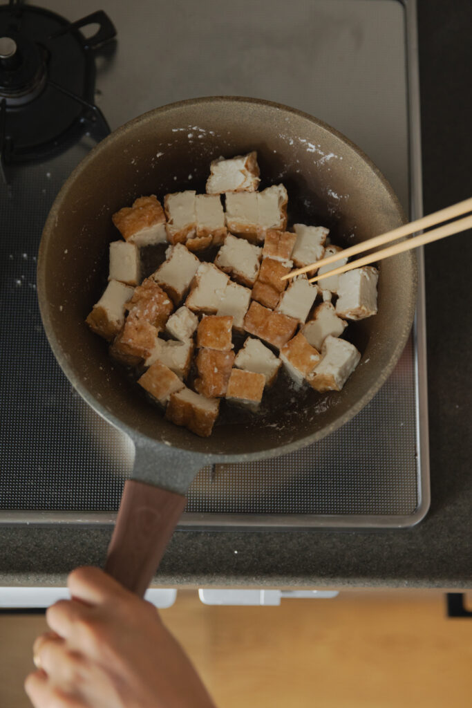 Homemade crispy Atsuage teriyaki deep-fried tofu cubes coated in a glossy sweet savory sauce