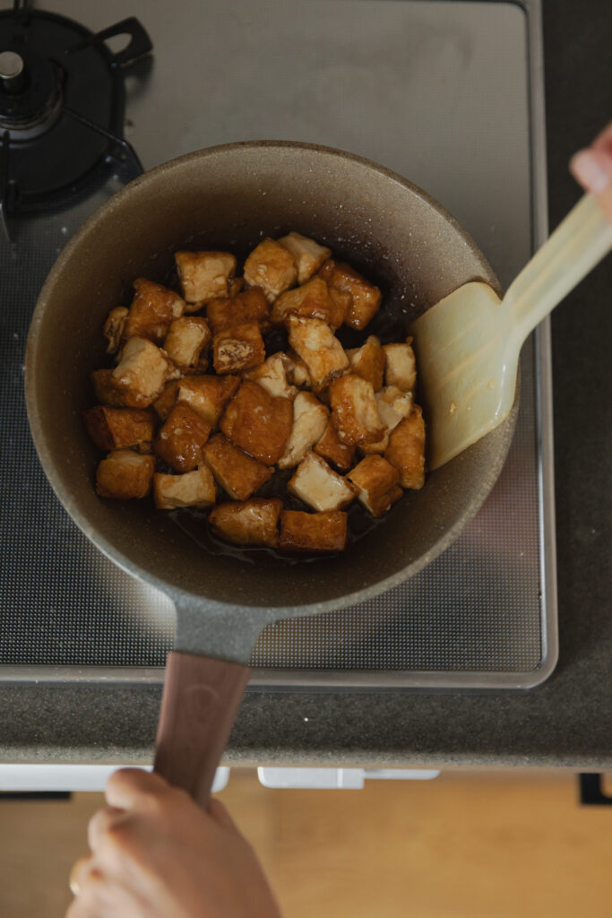Homemade crispy Atsuage teriyaki deep-fried tofu cubes coated in a glossy sweet savory sauce