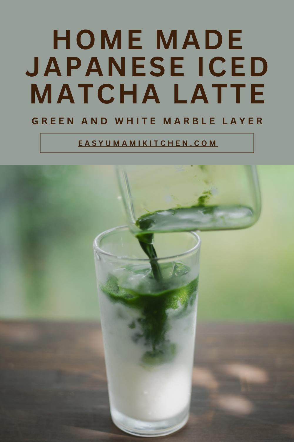 Homemade authentic Japanese iced matcha latte with a beautiful green and white marble layer in a tall glass
