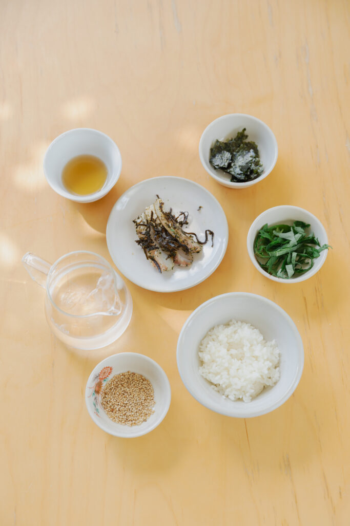 Homemade Japanese cold dashi ochazuke with cured sea bream and shiso leaves