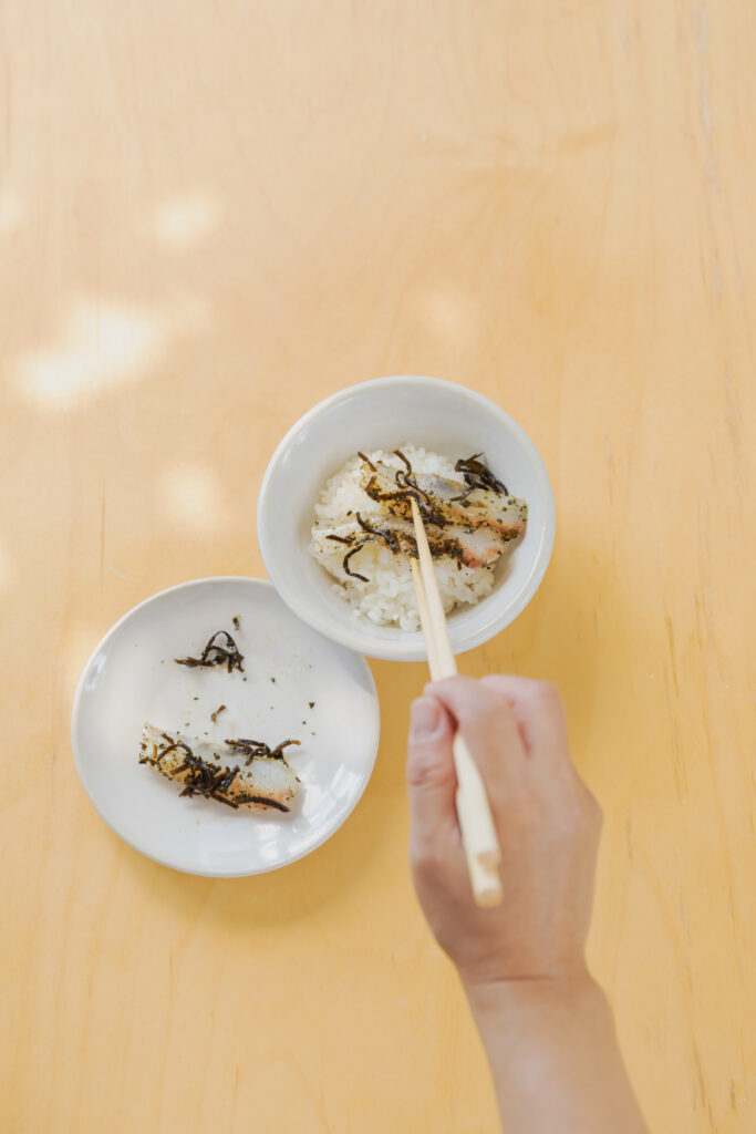 Homemade Japanese cold dashi ochazuke with cured sea bream and shiso leaves