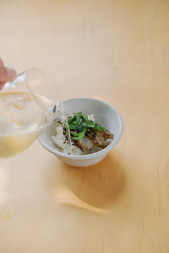 Homemade Japanese cold dashi ochazuke with cured sea bream and shiso leaves