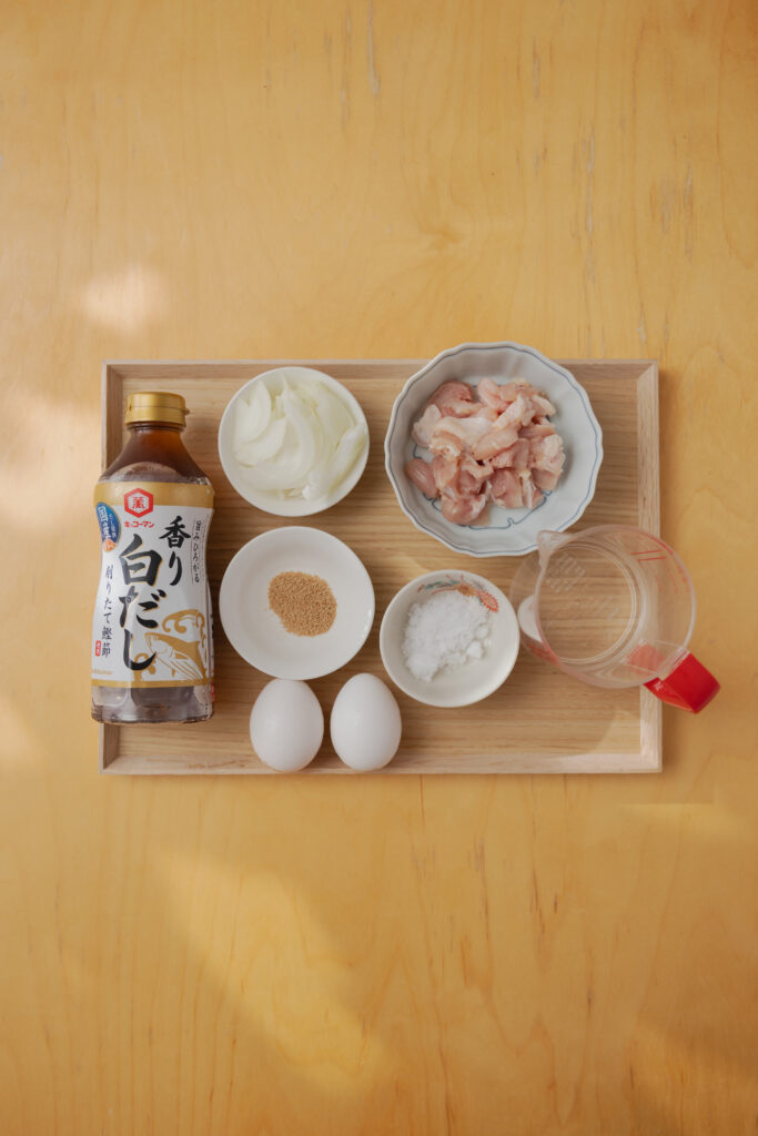 Homemade Japanese Oyako-don chicken and egg rice bowl with dashi