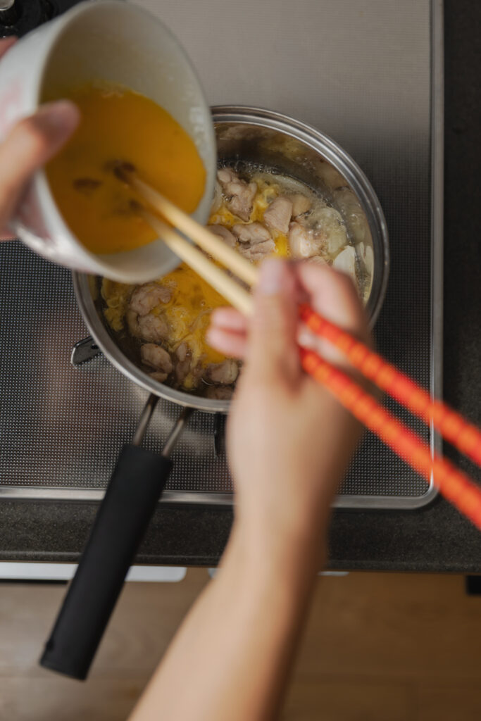 Homemade Japanese Oyako-don chicken and egg rice bowl with dashi