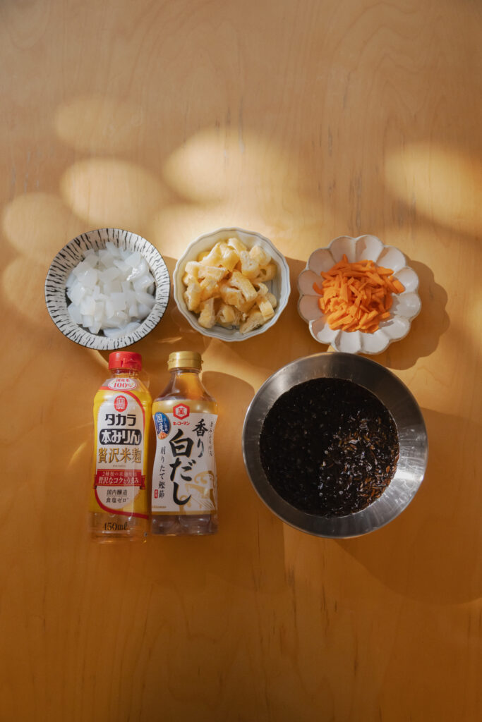 Authentic Japanese Hijiki Seaweed Salad with carrots and fried tofu in a ceramic bowl